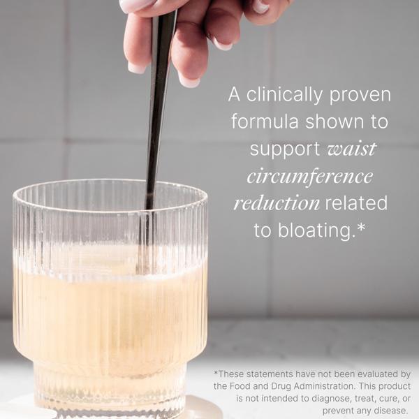 Glass of ni biome with a spoon being stirred, text about waist circumference reduction related to bloating.